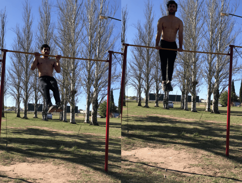 hombre haciendo muscle up en barra, parque de calistenia