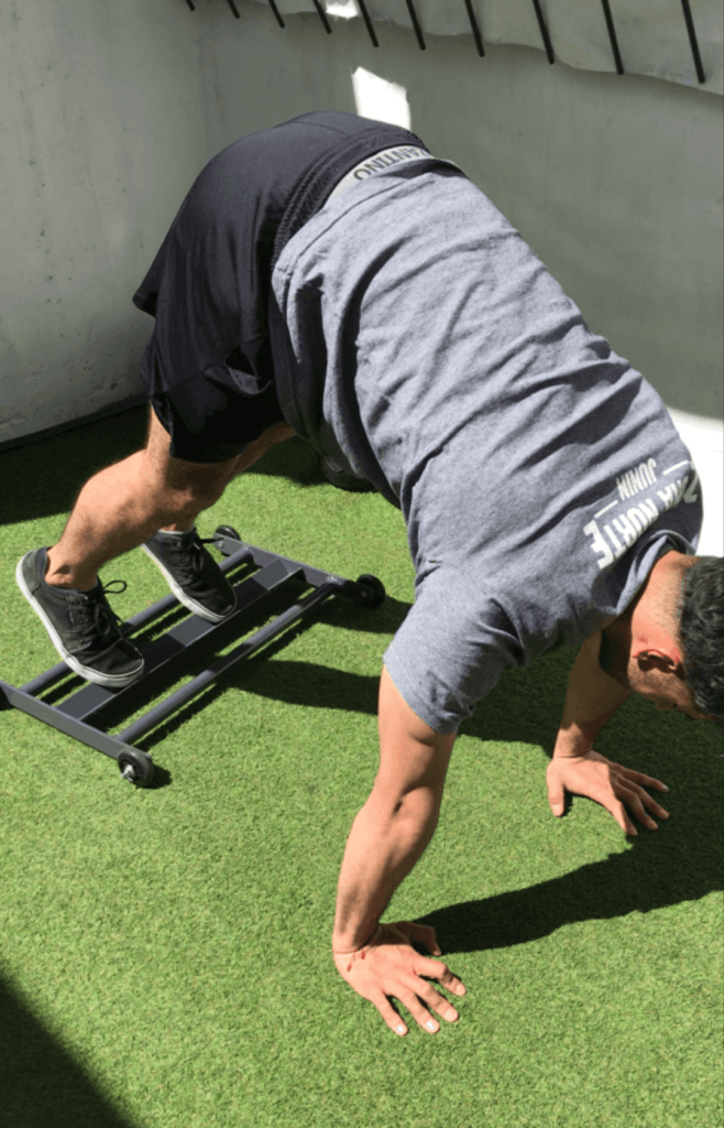 Ejercicio de abdominales con glute ham roller